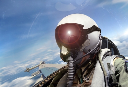 Fighter pilot cockpit view at sunriseの写真素材