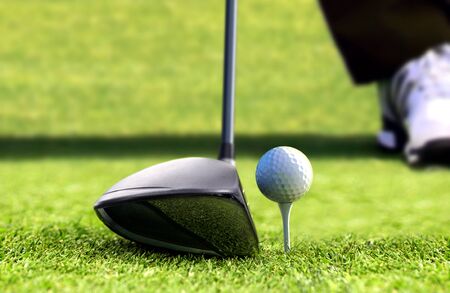 Golf ball ready for tee offの写真素材