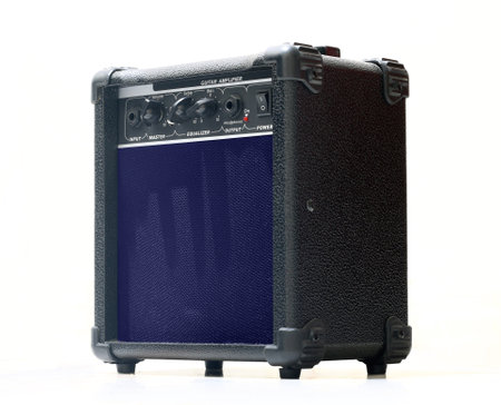 Electric guitar amplifier in close up over white backgroundの写真素材