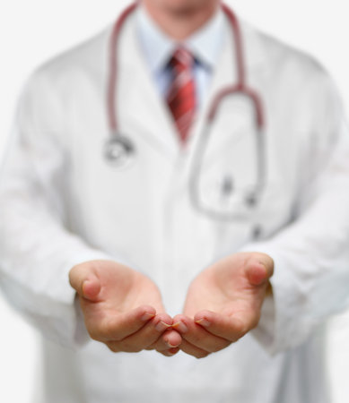 Doctor with empty open hands for health care advertisement conceptの写真素材