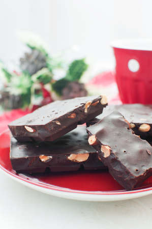 Chocolate bar and christmas decor side view verticalの写真素材