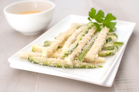Zucchini cut in batter and breadcrumbs horizontalの写真素材