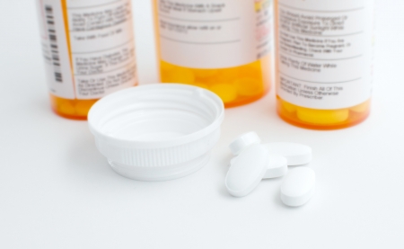White drugs oval tablets closeup 