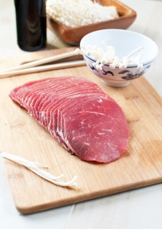 Beef sliced thinly for asian dishの写真素材