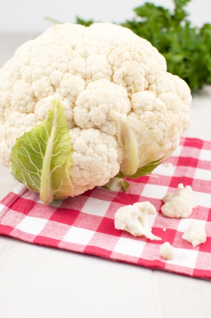 Cauliflower uncooked in the home kitchen verticalの写真素材