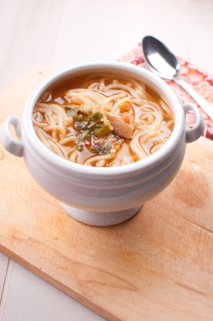 Noodle soup with vegetables and mushrooms verticalの写真素材
