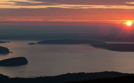 Beautiful bright sunrise over harbor islands の写真素材