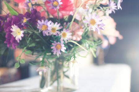 Wild flowers bouquet in soft pastel highkey lightの写真素材