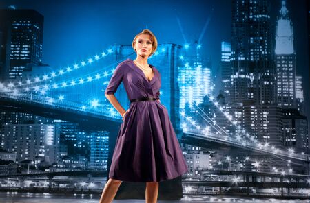 Businesswoman on the cityscape backgroundの写真素材