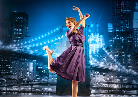 Businesswoman on the cityscape backgroundの写真素材