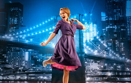 Businesswoman on the cityscape backgroundの写真素材