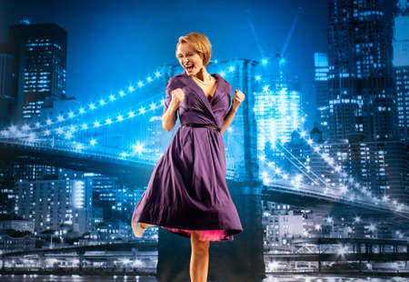Businesswoman on the cityscape backgroundの写真素材