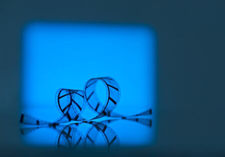 Strip of the film on the blue screenの写真素材