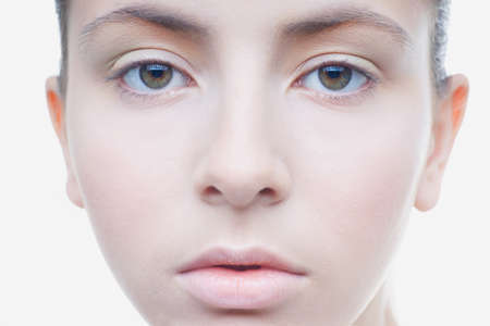 Beautiful clean face of the young girlの写真素材