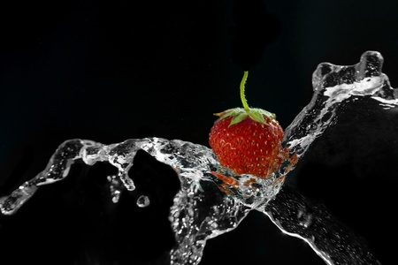 Shot of strawberry in the waterの写真素材