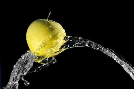 Shot of apple in the waterの写真素材
