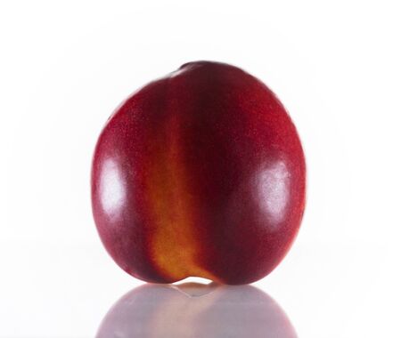 Juicy nectarine on white backgroundの写真素材