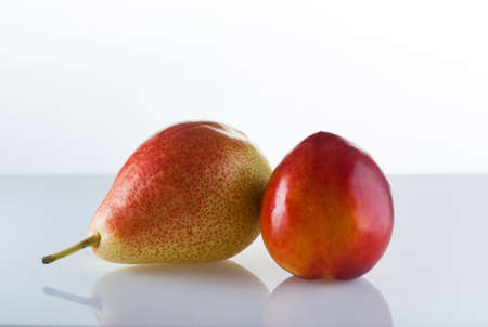Ripe pear and juicy nectarine の写真素材
