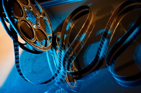 Reel of film on the blue backgroundの写真素材