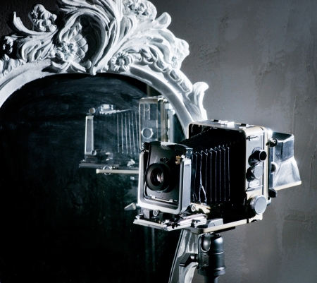Camera of the last century and mirrorの写真素材