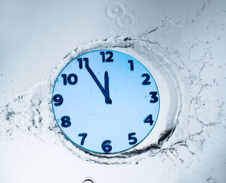 Unusual design clock with waterの写真素材