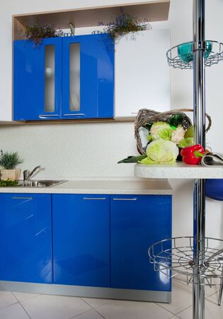 Blue kitchen interior with vegetablesのeditorial素材