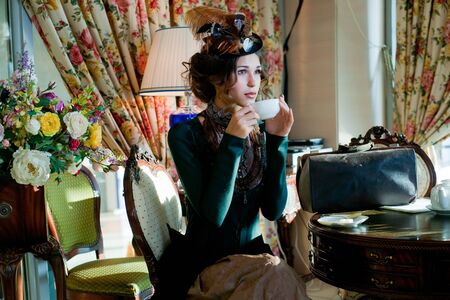 Beautiful lady with a cup of coffee