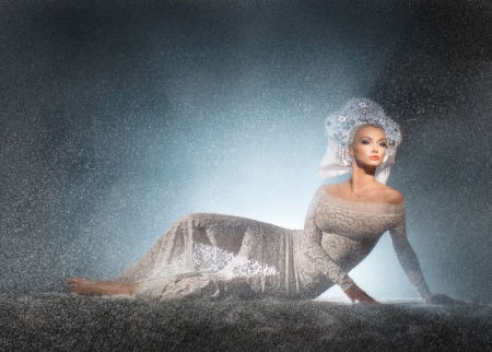 Beautiful snow maiden in lace dressの写真素材
