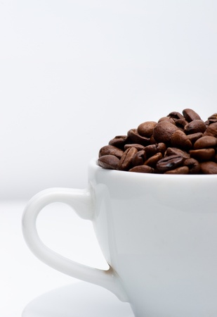 Cup full of coffee beansの写真素材