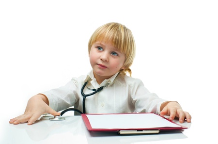 Little boy playing the doctorの写真素材