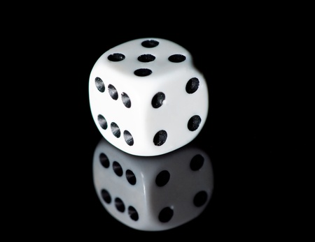 White dice on the black backgroundの写真素材