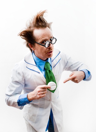 Funny doctor with pills in handの写真素材