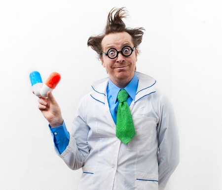 Funny doctor with tablet and fruit in handの写真素材