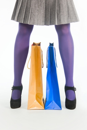 Female legs and colored bagsの写真素材