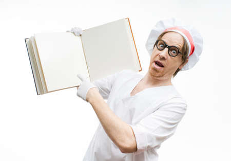 Chef with the cookbook on white backgroundの写真素材