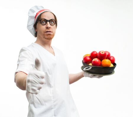 Funny chef with fruit on white backgroundの写真素材