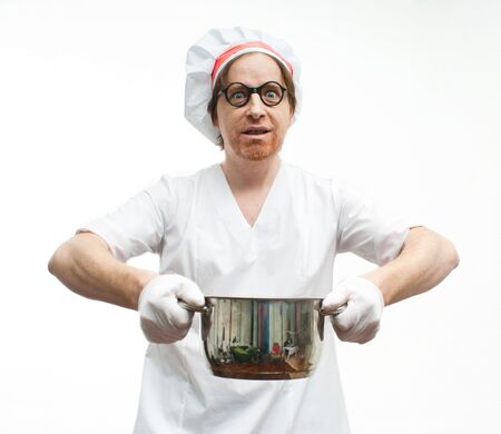 Funny chef with pan on white backgroundの写真素材