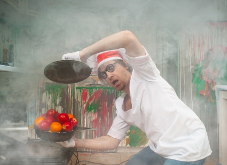Crazy chef prepares a dessertの写真素材