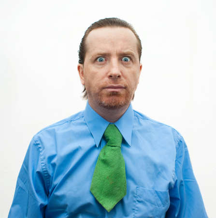 Crazy businessman with eyes wide openの写真素材