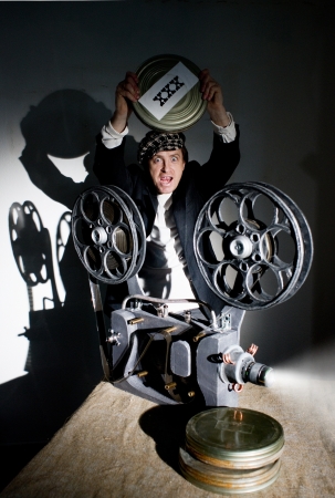 Crazy projectionist shows new filmの写真素材