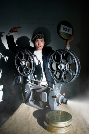 Crazy projectionist shows new filmの写真素材