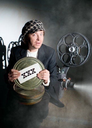 Crazy projectionist shows new filmの写真素材