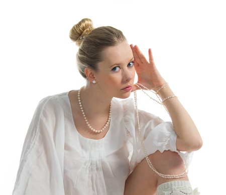 Portrait of beautiful blonde with pearlsの写真素材