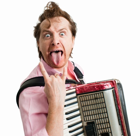 Portrait of crazy musician with accordionの写真素材