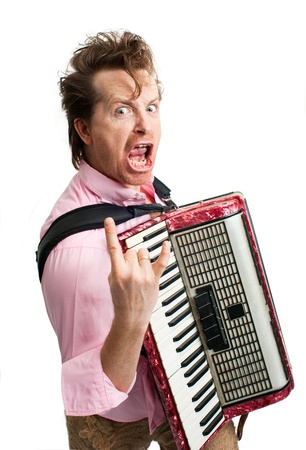 Portrait of crazy musician with accordionの写真素材