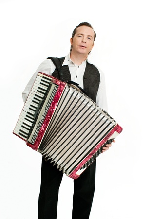 Professional musician with accordion in his handsの写真素材