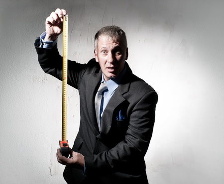 Construction Director with tape measureの写真素材
