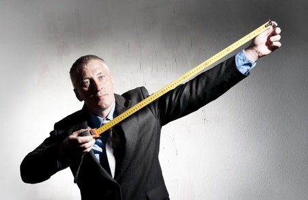 Construction Director with tape measureの写真素材