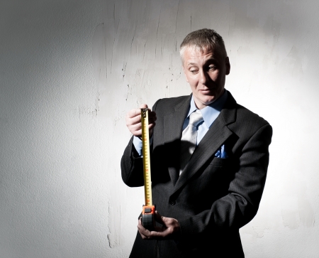 Construction Director with tape measureの写真素材