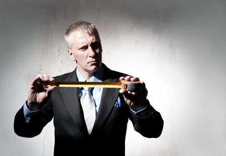 Construction Director with tape measureの写真素材